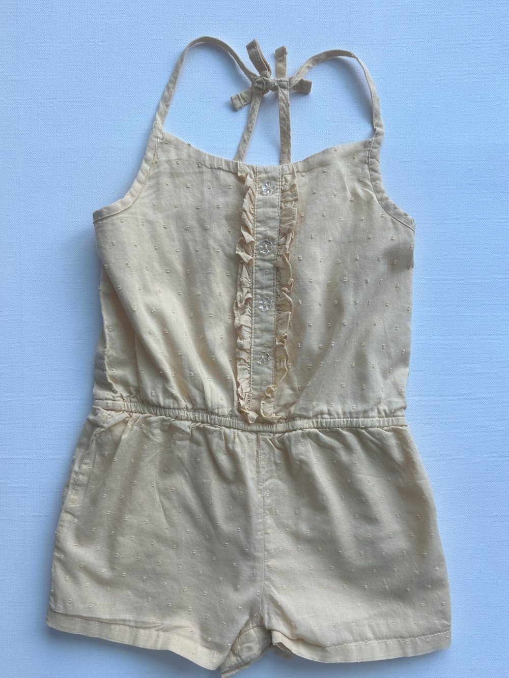 Savannah girl’s Sleeveless Romper with Ruffle Front.  Size 4T.